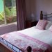 Queen size bedroom overlooking the garden